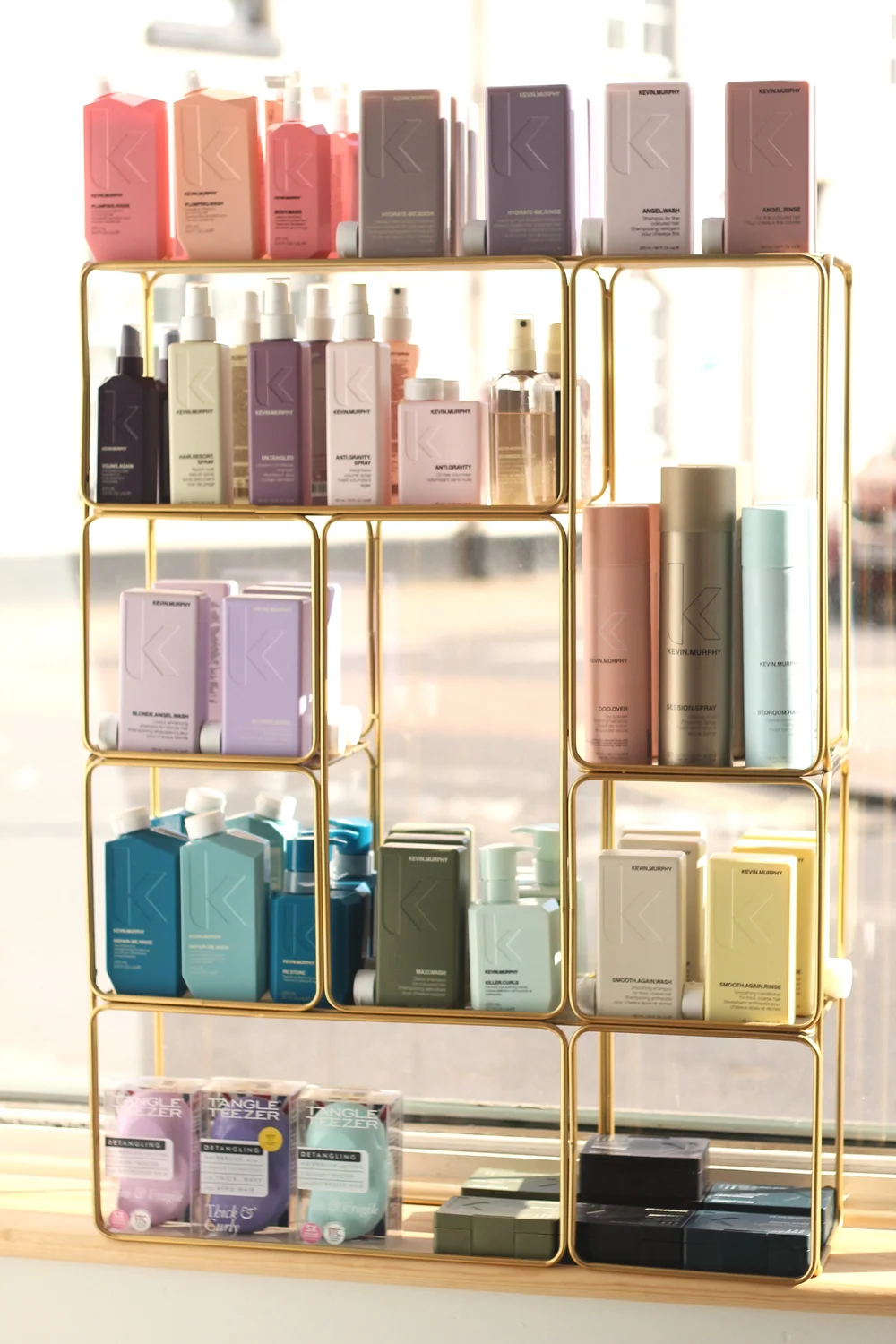 Kevin Murphy Colour Me product range displayed in gold shelving